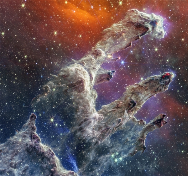 NASA公布宇宙“创生之柱”新影像：哈勃、韦布合力拍摄距离地球6500光年